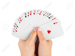 5180894-las-manos-y-jugando-a-las-cartas-aisladas-sobre-fondo-blanco-foto-de-archivo