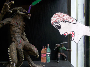 Àngel Chamón treballa, amb l'estètica del còmic, la confrontació d'uns monstres que es troben amb un personatge que els escridassa dins d'una botiga.